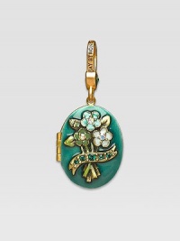 Emerald-colored CRYSTALLIZED - Swarovski Elements sparkle on this handcrafted, hand-enameled birthstone locket that opens to hold a favorite photo. Crystal Enamel 18k goldplated brass & brass-plated pewter Month indicated on the back Length, about 1¼ Width, about 1 Spring clip clasp Made in USA