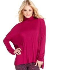 Half turtleneck, half poncho, this top from Calvin Klein Jeans offers a cozy take on weekend style.