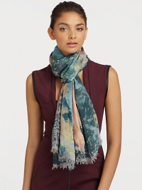 A luxurious style with hints of cashmere, finished with eyelash fringe and a colorful art-like print.90% modal/10% cashmereAbout 55 X 73Dry cleanImported A luxurious style with hints of cashmere, finished with eyelash fringe and a colorful art-like print.90% modal/10% cashmereAbout 55 X 73Dry cleanImported