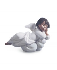 An angel from Lladro, the Heavenly Dreamer figurine watches over your family from a fluffy white cloud, in delicately handcrafted porcelain. An angel from Lladro, the Heavenly Dreamer figurine watches over your family from a fluffy white cloud, in delicately handcrafted porcelain.