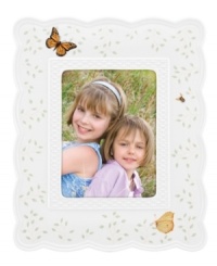 Crafted of elegant white porcelain, this Lenox picture frame combines the beloved Butterfly Meadow motif with a scalloped edge and textured accents for a look of country charm. Crafted of elegant white porcelain, this Lenox picture frame combines the beloved Butterfly Meadow motif with a scalloped edge and textured accents for a look of country charm.