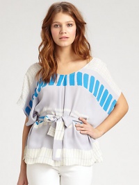 Printed cotton/silk georgette in a draped blouse cinched at the waist by a tie-front sash.ScoopneckDropped shouldersDolman sleevesSelf-beltScoopbackAbout 19 from shoulder to hemSilkDry cleanImportedModel shown is 5'8½ (174cm) wearing US size Small. Printed cotton/silk georgette in a draped blouse cinched at the waist by a tie-front sash.ScoopneckDropped shouldersDolman sleevesSelf-beltScoopbackAbout 19 from shoulder to hemSilkDry cleanImportedModel shown is 5'8½ (174cm) wearing US size Small.