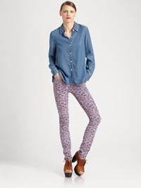 Tap into the chambray trend with this lengthy denim button-down shirt. Point collarButton frontLong sleeves with buttoned cuffsLonger length hits below the hipsLyocellMachine washImportedModel shown is 5'10 (177cm) wearing US size 2. Tap into the chambray trend with this lengthy denim button-down shirt. Point collarButton frontLong sleeves with buttoned cuffsLonger length hits below the hipsLyocellMachine washImportedModel shown is 5'10 (177cm) wearing US size 2.