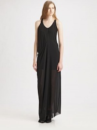 Floor-length tank dress enhanced by strategically placed gathering, semi-sheer hem and a sporty racerback. Rounded v-neckSleevelessGathered sideSemi-sheer asymmetrical hemRacerbackFully linedAbout 43 from natural waistPolyesterDry cleanImportedModel shown is 5'10 (177cm) wearing US size 4. Floor-length tank dress enhanced by strategically placed gathering, semi-sheer hem and a sporty racerback. Rounded v-neckSleevelessGathered sideSemi-sheer asymmetrical hemRacerbackFully linedAbout 43 from natural waistPolyesterDry cleanImportedModel shown is 5'10 (177cm) wearing US size 4.