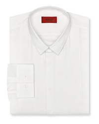 Slim fit tuxedo dress shirt with intricate pintuck detail in front. Small point collar. Barrel cuffs. Slim fit tuxedo dress shirt with intricate pintuck detail in front. Small point collar. Barrel cuffs.