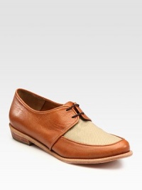 Burnished leather in a traditional menswear-inspired design, updated by contrasting, ultra-stretchy canvas trim. Stacked heel, 1 (25mm)Leather and canvas upperLeather lining and solePadded insoleImportedOUR FIT MODEL RECOMMENDS ordering one half size up as this style runs small. Burnished leather in a traditional menswear-inspired design, updated by contrasting, ultra-stretchy canvas trim. Stacked heel, 1 (25mm)Leather and canvas upperLeather lining and solePadded insoleImportedOUR FIT MODEL RECOMMENDS ordering one half size up as this style runs small.