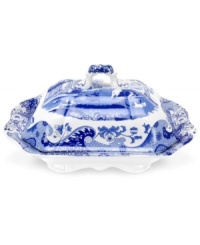 With a quaint country scene and the Imari Oriental border of Spode's Blue Italian dinnerware, this covered vegetable dish lends distinct old-world charm to traditional tables. With a quaint country scene and the Imari Oriental border of Spode's Blue Italian dinnerware, this covered vegetable dish lends distinct old-world charm to traditional tables.