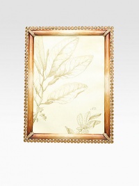 A keepsake piece fit for a special photograph, beautifully handcrafted in goldplated pewter. Swarovski crystal trim Made in USADIMENSION INFORMATION3 X 4 (4 X 5 overall)4 X 6 (5 X 7 overall)5 X 7 (6 X 8 overall) A keepsake piece fit for a special photograph, beautifully handcrafted in goldplated pewter. Swarovski crystal trim Made in USADIMENSION INFORMATION3 X 4 (4 X 5 overall)4 X 6 (5 X 7 overall)5 X 7 (6 X 8 overall)