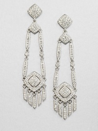 A long and elegant piece encrusted in pavé crystals. CrystalsRhodium-plated brassLength, about 2.5Post backImported 