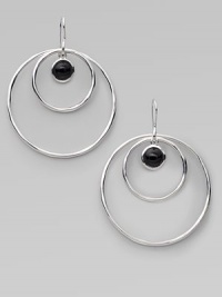 From the Scultura Collection. Double circles of polished sterling silver surround a center drop of smooth black onyx.Black onyx Sterling silver Diameter, about 2¼ Ear wire Imported From the Scultura Collection. Double circles of polished sterling silver surround a center drop of smooth black onyx.Black onyx Sterling silver Diameter, about 2¼ Ear wire Imported