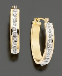 The traditional hoop earrings embellished with the sparkle of a diamond accent. Set in 14k gold. The traditional hoop earrings embellished with the sparkle of a diamond accent. Set in 14k gold.