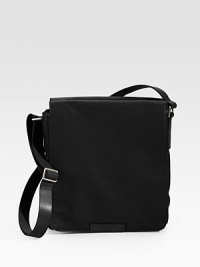 Perfect for sightseeing and the like, this multi-functional bag is crafted in a sleek leather design.Zip closureAdjustable shoulder strapInterior pocket10½W x 13H x 10¼DImported Perfect for sightseeing and the like, this multi-functional bag is crafted in a sleek leather design.Zip closureAdjustable shoulder strapInterior pocket10½W x 13H x 10¼DImported