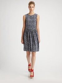 A charming and flattering silhouette gets a bold twist in an allover leopard print.Scoop neckPlunge backFitted, wrapped waistAbout 20 from natural waistSilkDry cleanImported A charming and flattering silhouette gets a bold twist in an allover leopard print.Scoop neckPlunge backFitted, wrapped waistAbout 20 from natural waistSilkDry cleanImported