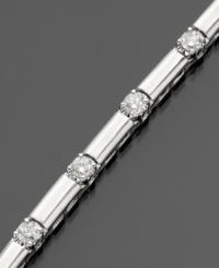 Glittering round-cut diamonds (2 ct. t.w.) are set in an intriguing 14k gold wave setting. 2 carat diamond bracelet measures 7 inches. Glittering round-cut diamonds (2 ct. t.w.) are set in an intriguing 14k gold wave setting. 2 carat diamond bracelet measures 7 inches.