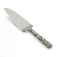 Marked by incredible handcrafting, this cake server features countless molten beads carefully placed by a highly skilled artisan. The look is streamlined, timeless, organic and soulful. Marked by incredible handcrafting, this cake server features countless molten beads carefully placed by a highly skilled artisan. The look is streamlined, timeless, organic and soulful.