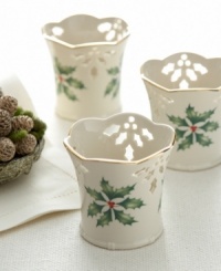 With a scalloped rim and pierced design of holly and berries, this votive set complements the rest of the Holiday collection from Lenox. With a scalloped rim and pierced design of holly and berries, this votive set complements the rest of the Holiday collection from Lenox.