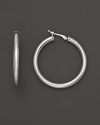 Simply chic, these 14K. white gold hoops are timeless classics.