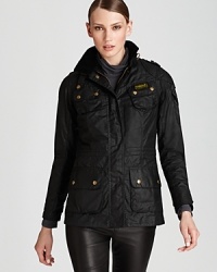 Withstand the weather with this sleek Barbour jacket rendered in waxed cotton and boasting multiple outer pockets. Withstand the weather with this sleek Barbour jacket rendered in waxed cotton and boasting multiple outer pockets.