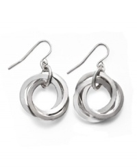 Add a touch of class with chic circles. Crafty drop earrings from the Lauren by Ralph Lauren collection feature three, silver tone, mixed metal interlocking circles on a french wire backing. Approximate drop: 1-1/4 inches. Add a touch of class with chic circles. Crafty drop earrings from the Lauren by Ralph Lauren collection feature three, silver tone, mixed metal interlocking circles on a french wire backing. Approximate drop: 1-1/4 inches.
