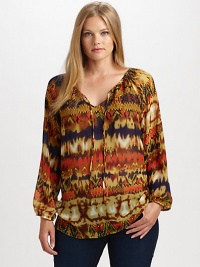 A vibrantly printed design with a self-tie neckline and a relaxed fit that will flatter your shape. Self-tie detail at necklineLong sleevesElasticized cuffsAllover printContrasting trimBack yokeAbout 27 from shoulder to hemPolyesterDry cleanImported A vibrantly printed design with a self-tie neckline and a relaxed fit that will flatter your shape. Self-tie detail at necklineLong sleevesElasticized cuffsAllover printContrasting trimBack yokeAbout 27 from shoulder to hemPolyesterDry cleanImported