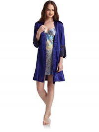 THE LOOKWrap front with tie closureThree-quarter length sleeves with lace appliquéd cuffsDual side seam pocketsFront tie waist with back ruchingTHE FITAbout 39 from shoulder to hemTHE MATERIALPolyesterCARE & ORIGINMachine washImported THE LOOKWrap front with tie closureThree-quarter length sleeves with lace appliquéd cuffsDual side seam pocketsFront tie waist with back ruchingTHE FITAbout 39 from shoulder to hemTHE MATERIALPolyesterCARE & ORIGINMachine washImported