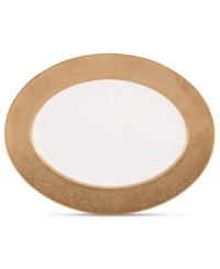 Make any occasion memorable with Gold Dust dinnerware. Combining the urbane style of Donna Karan with the renowned craftsmanship of Lenox, this timeless bone china oval platter radiates luxury with a wide band of matte-textured gold. Make any occasion memorable with Gold Dust dinnerware. Combining the urbane style of Donna Karan with the renowned craftsmanship of Lenox, this timeless bone china oval platter radiates luxury with a wide band of matte-textured gold.