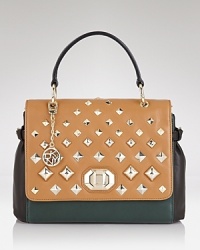 A ladylike shape with pyramid studding are a modern mash-up on DKNY's structured handbag.