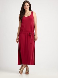 Utterly flattering, this sleeveless dress features a feminine neckline, an elasticized waist and a self-tie belt that will define your shape.U-neckSleevelessDropped waistSelf-tie beltSide slitsAbout 38 from natural waist94% polyester/6% spandexMachine washImported Utterly flattering, this sleeveless dress features a feminine neckline, an elasticized waist and a self-tie belt that will define your shape.U-neckSleevelessDropped waistSelf-tie beltSide slitsAbout 38 from natural waist94% polyester/6% spandexMachine washImported