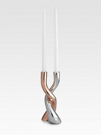 Curved columns of metal alloy, one with a glowing copperplate finish, twist gracefully around one another in this refined design.Metal alloy and copperplateHandmadeSigned by designer Karim Rashid9HHand washImported Curved columns of metal alloy, one with a glowing copperplate finish, twist gracefully around one another in this refined design.Metal alloy and copperplateHandmadeSigned by designer Karim Rashid9HHand washImported