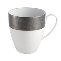 The bold industrial look of cast iron gets an elevated update with this fine assortment of Limoges porcelain dinnerware from Michael Aram. Each vivid white piece is edged with a wide band of lustrous metallic gray. The bold industrial look of cast iron gets an elevated update with this fine assortment of Limoges porcelain dinnerware from Michael Aram. Each vivid white piece is edged with a wide band of lustrous metallic gray.