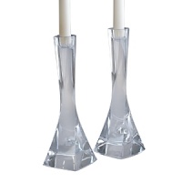 Designed by Artist Lisa Smith, Nambé's Piroett candlesticks seem to twirl like a dancer's skirt. Elegant with a fluid sense of motion, they radiate light beautifully. Designed by Artist Lisa Smith, Nambé's Piroett candlesticks seem to twirl like a dancer's skirt. Elegant with a fluid sense of motion, they radiate light beautifully.