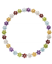 Petal perfection. Crafted in sterling silver, petite flowers adorn this pretty necklace. Crafted in sterling silver with pear-cut blue topaz (15 ct. t.w.), citrine (10-3/4 ct. t.w.), garnet (15 ct. t.w.), amethyst (10-3/4 ct. t.w.), peridot (13-1/5 ct. t.w.) and white topaz (15 ct. t.w.). Approximate length: 17-3/4 inches.