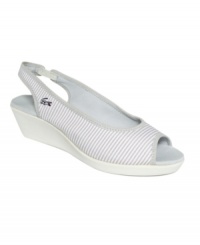 For those casual days. Lacoste's Cressy slingback wedges feature a striped print and the brand's signature logo on the side. For those casual days. Lacoste's Cressy slingback wedges feature a striped print and the brand's signature logo on the side.