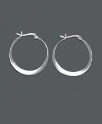An intriquing twist on a traditional pair of hoops, these sterling silver twist hoop earrings by Unwritten are an instant classic. Approximate diameter: 1 inch. An intriquing twist on a traditional pair of hoops, these sterling silver twist hoop earrings by Unwritten are an instant classic. Approximate diameter: 1 inch.