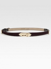 A soft suede style with leather accents and signature goldtone hardware. Width, about .75Made in Italy A soft suede style with leather accents and signature goldtone hardware. Width, about .75Made in Italy