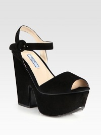 A strong platform and heel lift this suede design with patent leather trim. Self-covered heel, 5 (125mm)Covered platform, 2 (50mm)Compares to a 3 heel (75mm)Suede upper with patent leather trimAdjustable ankle strapLeather liningLeather solePadded insoleMade in Italy A strong platform and heel lift this suede design with patent leather trim. Self-covered heel, 5 (125mm)Covered platform, 2 (50mm)Compares to a 3 heel (75mm)Suede upper with patent leather trimAdjustable ankle strapLeather liningLeather solePadded insoleMade in Italy