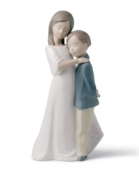 A moving celebration of the bond between brother and sister. Crafted by Lladró, Spain's most esteemed artisans of porcelain figurines. A moving celebration of the bond between brother and sister. Crafted by Lladró, Spain's most esteemed artisans of porcelain figurines.
