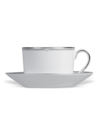 Inspired by the chic London neighborhood, the Waterford Sloane Square saucer is as chic and simple as its namesake, featuring a tailored band and platinum dot details. (Clearance)