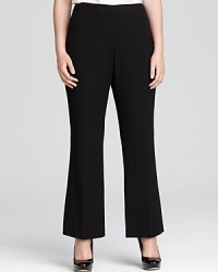 A flattering bootcut silhouette lends subtle ease to these DKNYC trousers. A flattering bootcut silhouette lends subtle ease to these DKNYC trousers.