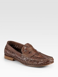 Traditional loafer style, made modern in finely woven leather for added flexibility and comfort.Leather upperLeather liningPadded insoleRubber soleImported Traditional loafer style, made modern in finely woven leather for added flexibility and comfort.Leather upperLeather liningPadded insoleRubber soleImported