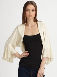This soft knit style is finished with a delicately ribbed shawl collar and matching flutter cuffs.Rib-knit shawl collarThree-quarter sleeves with rib-knit flutter cuffsAbout 12 from shoulder to hem80% rayon/20% nylonImportedDry clean This soft knit style is finished with a delicately ribbed shawl collar and matching flutter cuffs.Rib-knit shawl collarThree-quarter sleeves with rib-knit flutter cuffsAbout 12 from shoulder to hem80% rayon/20% nylonImportedDry clean