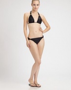 A flattering design featuring a feminine waistband is complemented by glamorously gilded hardware.Stretch bottomGold hardware84% polyamide/16% elastaneFully linedHand washImported Please note: Bikini top sold separately. 