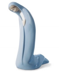 Shrouded in her iconic blue robe, Mary prostrates before baby Jesus. Beautifully handcrafted in Spain with elongated proportions, its purity of form and sentiment makes it a treasure to behold. Shrouded in her iconic blue robe, Mary prostrates before baby Jesus. Beautifully handcrafted in Spain with elongated proportions, its purity of form and sentiment makes it a treasure to behold.