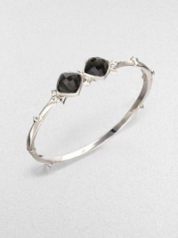 From the Superstud Collection. Two diamond-shaped faceted cushions of clear quartz layered over faux cat's eye create a dramatic look in a bangle of bright sterling silver dotted with pointy studs.Synthetic cat's eye and clear quartzRhodium-plated sterling silverDiameter, about 2.25Box-and-tongue claspImported From the Superstud Collection. Two diamond-shaped faceted cushions of clear quartz layered over faux cat's eye create a dramatic look in a bangle of bright sterling silver dotted with pointy studs.Synthetic cat's eye and clear quartzRhodium-plated sterling silverDiameter, about 2.25Box-and-tongue claspImported