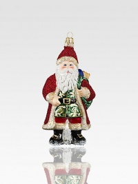A gorgeously detailed vintage Santa wears rich robes with glitter, beaded textures and intricate patterns, all crafted of mouth-blown, hand-painted glass, an exquisite heirloom for your tree.Glass6.5H X 3W X 2.5DImported A gorgeously detailed vintage Santa wears rich robes with glitter, beaded textures and intricate patterns, all crafted of mouth-blown, hand-painted glass, an exquisite heirloom for your tree.Glass6.5H X 3W X 2.5DImported