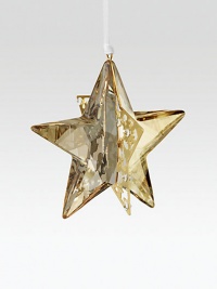 Modern and elegant, this glowing 3D design cleverly combines faceted golden crystal with pierced goldtone metal in an eye-catching ornament on a white satin ribbon.CrystalGoldtoneAbout 2.25H X 2.25WMade in Austria Modern and elegant, this glowing 3D design cleverly combines faceted golden crystal with pierced goldtone metal in an eye-catching ornament on a white satin ribbon.CrystalGoldtoneAbout 2.25H X 2.25WMade in Austria