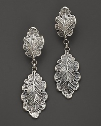Intricately wrought sterling silver oak leaves form elegant earrings. By Buccellati. Intricately wrought sterling silver oak leaves form elegant earrings. By Buccellati.