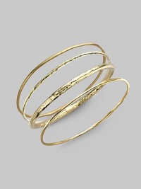 A simple, slender bangle of 18k gold has a stunning hammered texture that intriguingly catches and reflects light. 18k yellow gold Diameter, about 2½ Imported Please note: Bracelets sold separately. A simple, slender bangle of 18k gold has a stunning hammered texture that intriguingly catches and reflects light. 18k yellow gold Diameter, about 2½ Imported Please note: Bracelets sold separately.