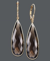 A splash of neutral sparkle always does the trick. These stunning earrings feature teardrop-shaped smokey topaz (24 ct. t.w.) with glittering diamond accents. Crafted in 14k gold. Approximate drop: 2 inches.