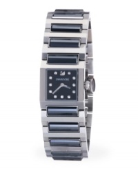 Mysterious hematite crystals stun on this elegant Dresstime watch by Swarovski. Stainless steel bracelet with 12 jet hematite crystals and square case. Matte black sunray dial features crystal accents at markers, logo at twelve o'clock and two silver tone hands. Swiss quartz movement. Water resistant to 30 meters. Two-year limited warranty. Mysterious hematite crystals stun on this elegant Dresstime watch by Swarovski. Stainless steel bracelet with 12 jet hematite crystals and square case. Matte black sunray dial features crystal accents at markers, logo at twelve o'clock and two silver tone hands. Swiss quartz movement. Water resistant to 30 meters. Two-year limited warranty.